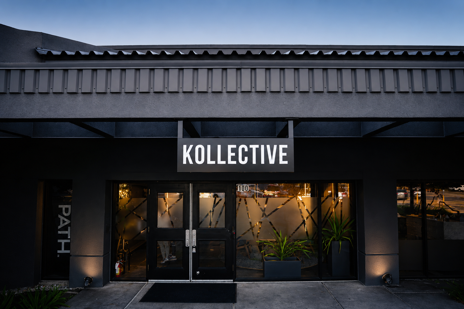 The Kollective South Congress storefront exterior at dusk