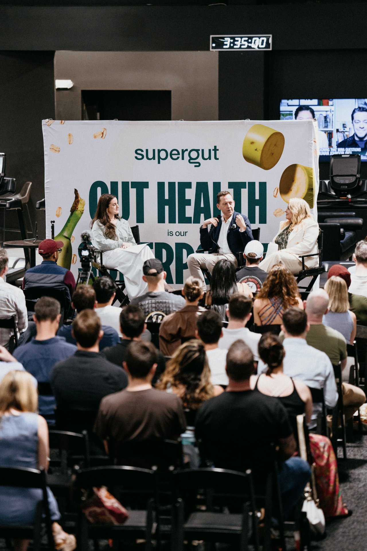 Members gathered on the performance floor during a live speaker session